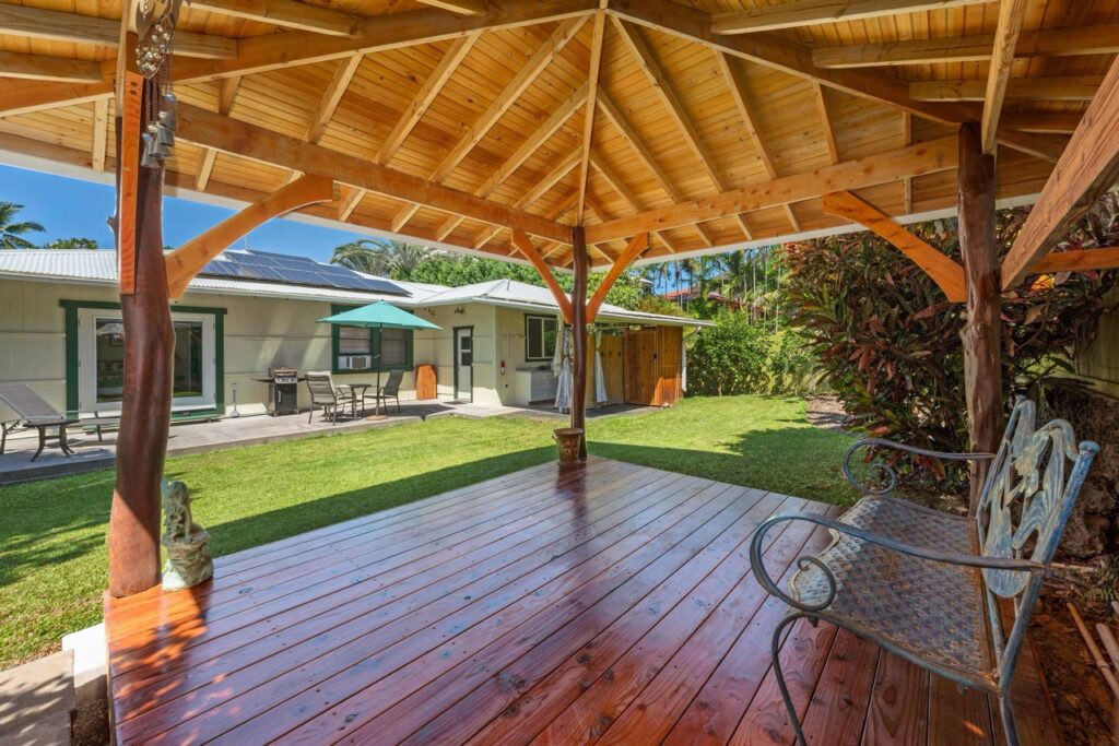 Back lanai and tropical yard