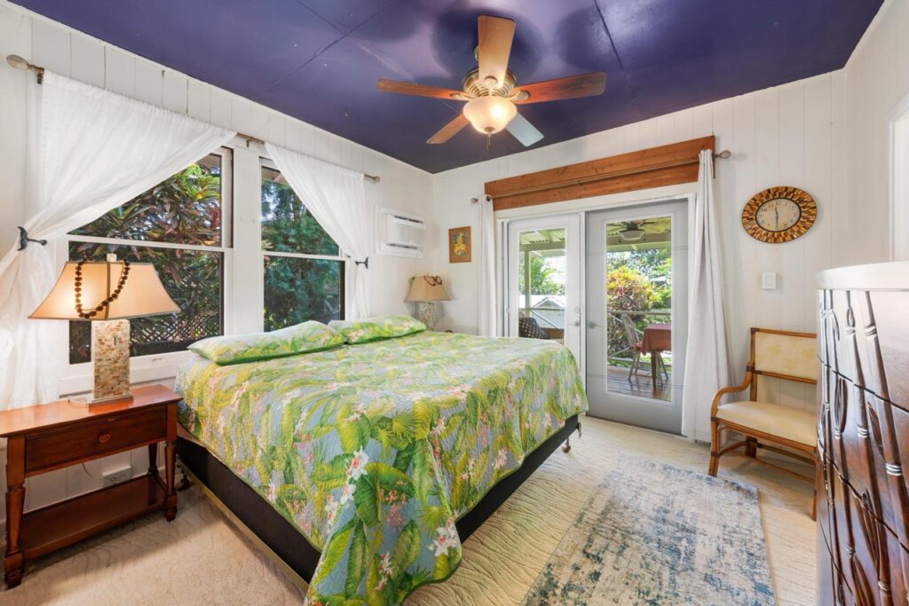 Bright primary suite at Keala Kai