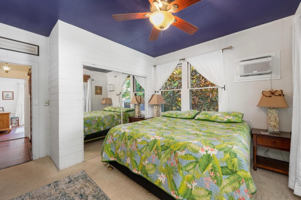 Primary suite with king bed at Keala Kai